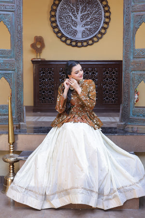 his crop top lehenga set with peplum blouse is perfect for festive and wedding wear, designed with rich embroidery and elegant flare.