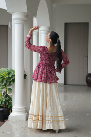 Model in festive pose wearing Kutchi Lehenga
