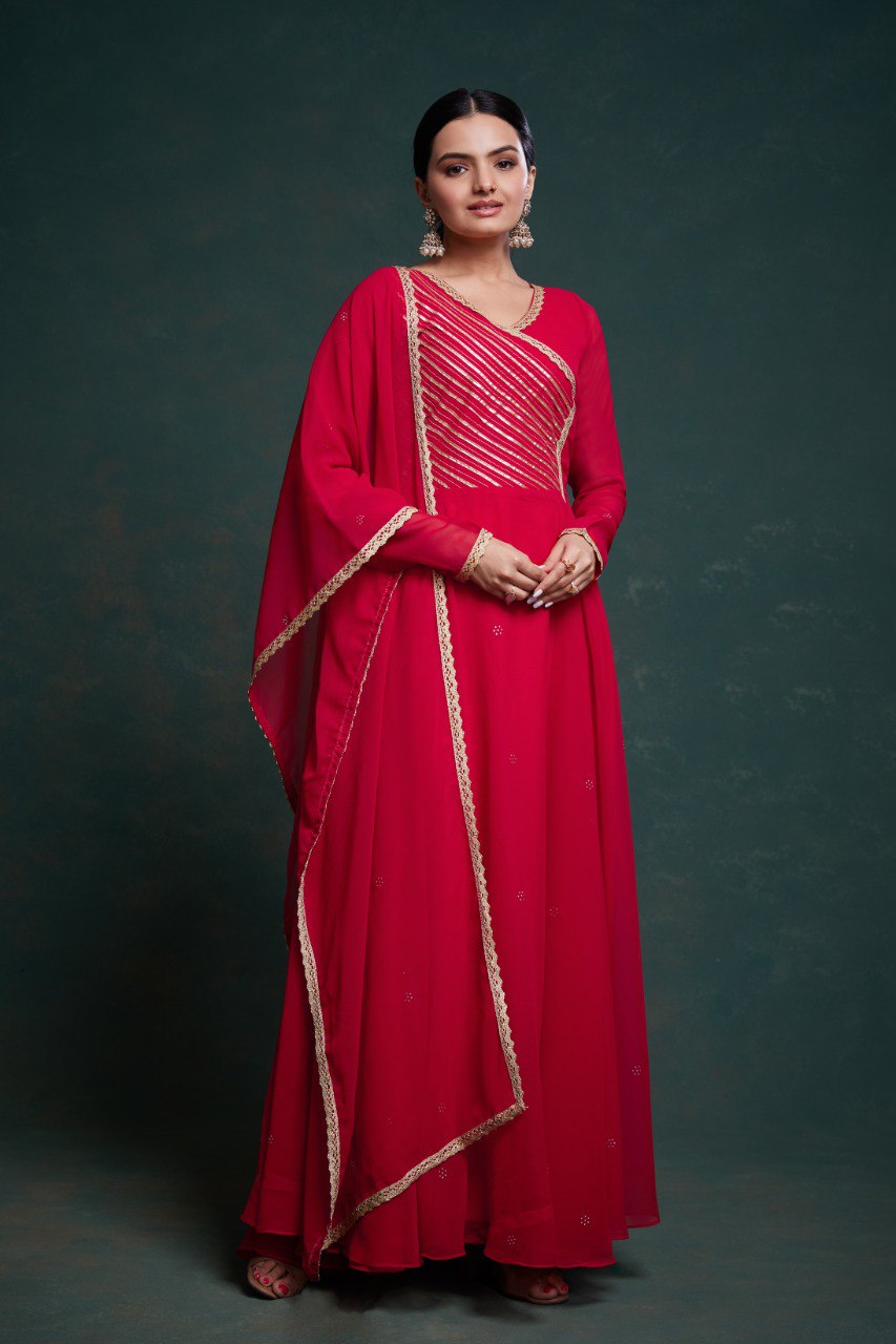 Flared red gown with embroidery details