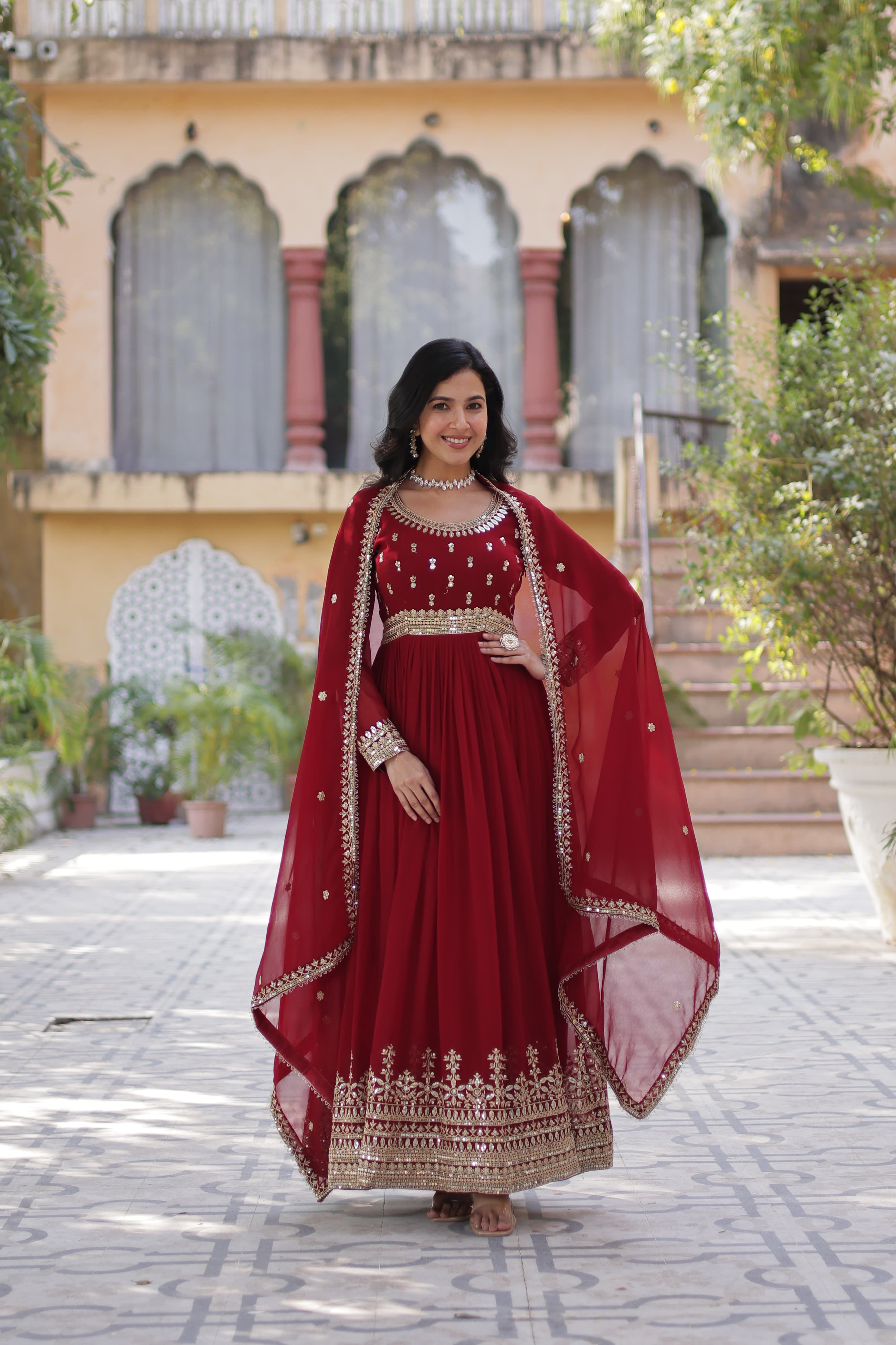 embroidered red gown