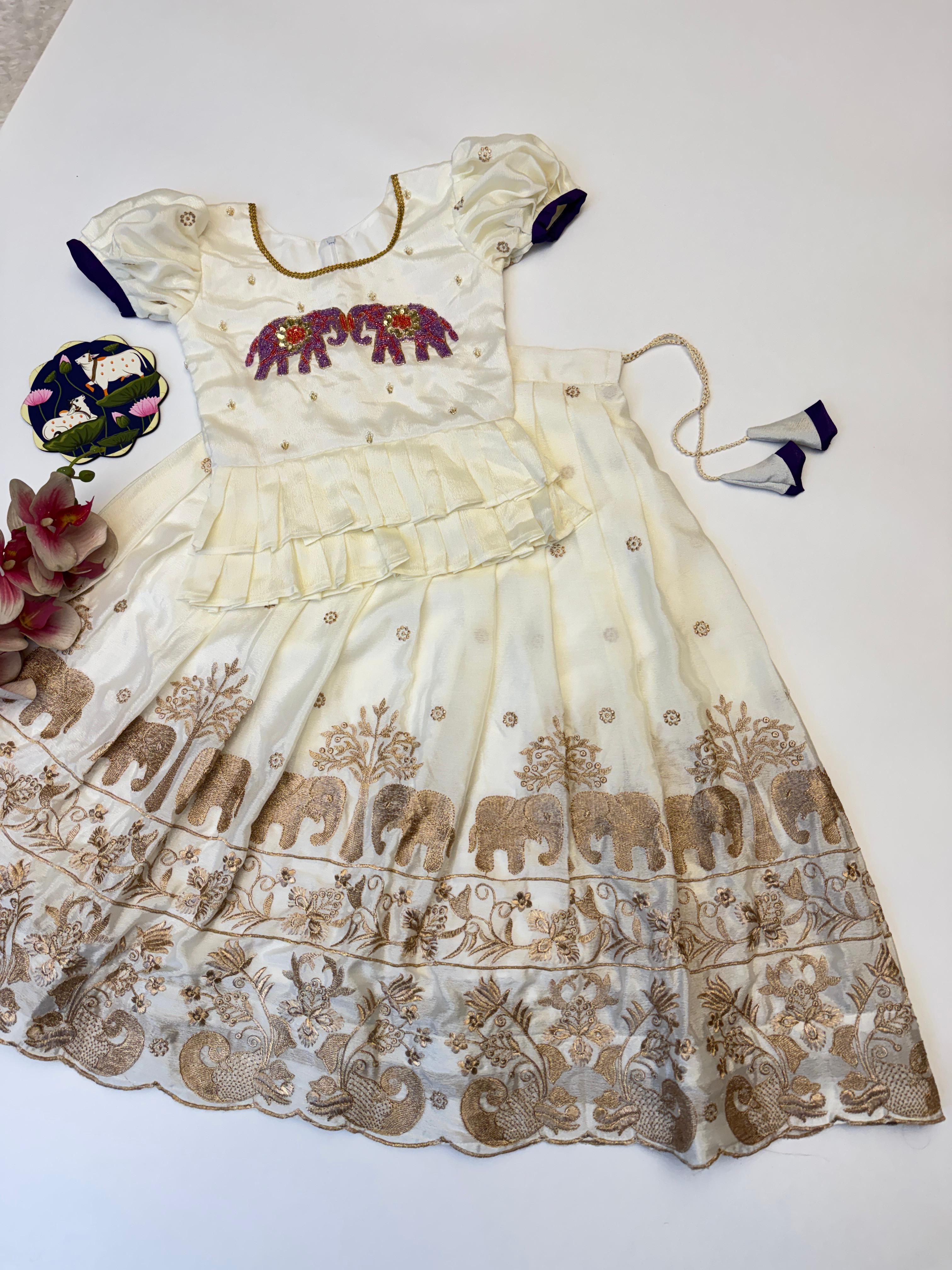 cream-elephant-lehenga-girls.jpeg