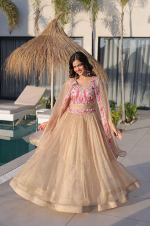 Beige sindur silk lehenga with embroidered blouse and shrug