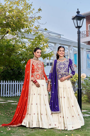 This embroidered lehenga choli set is perfect for weddings and festive occasions, designed in premium Vichitra and tissue silk fabric with rich detailing.