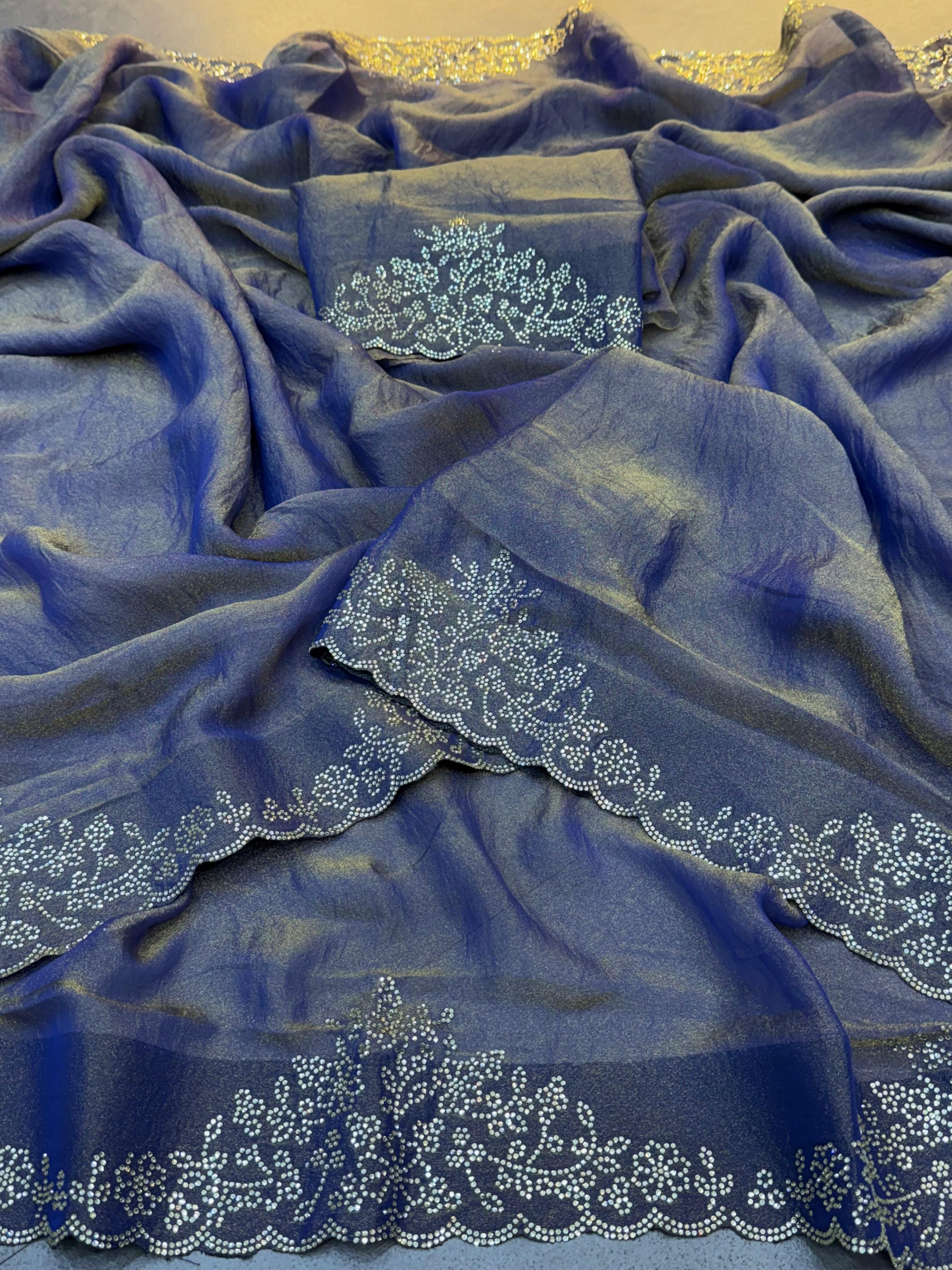 Close-up of saree border with diamond flower work