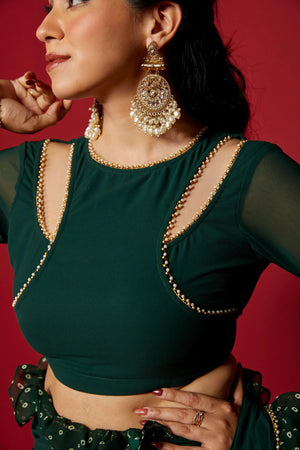 Close-up blouse design with sheer sleeves and pearls