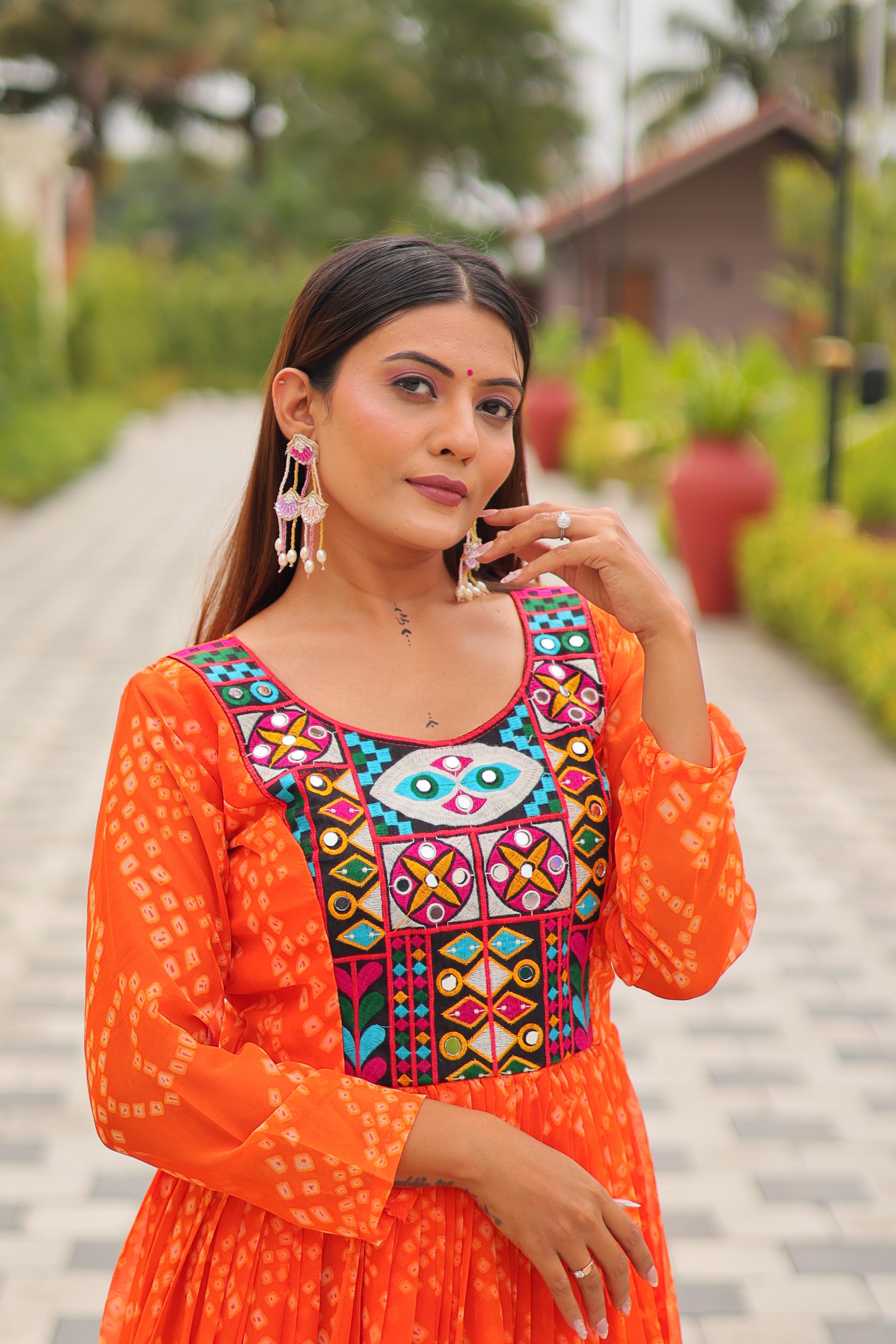 Close-up of embroidery thread work and mirror detail