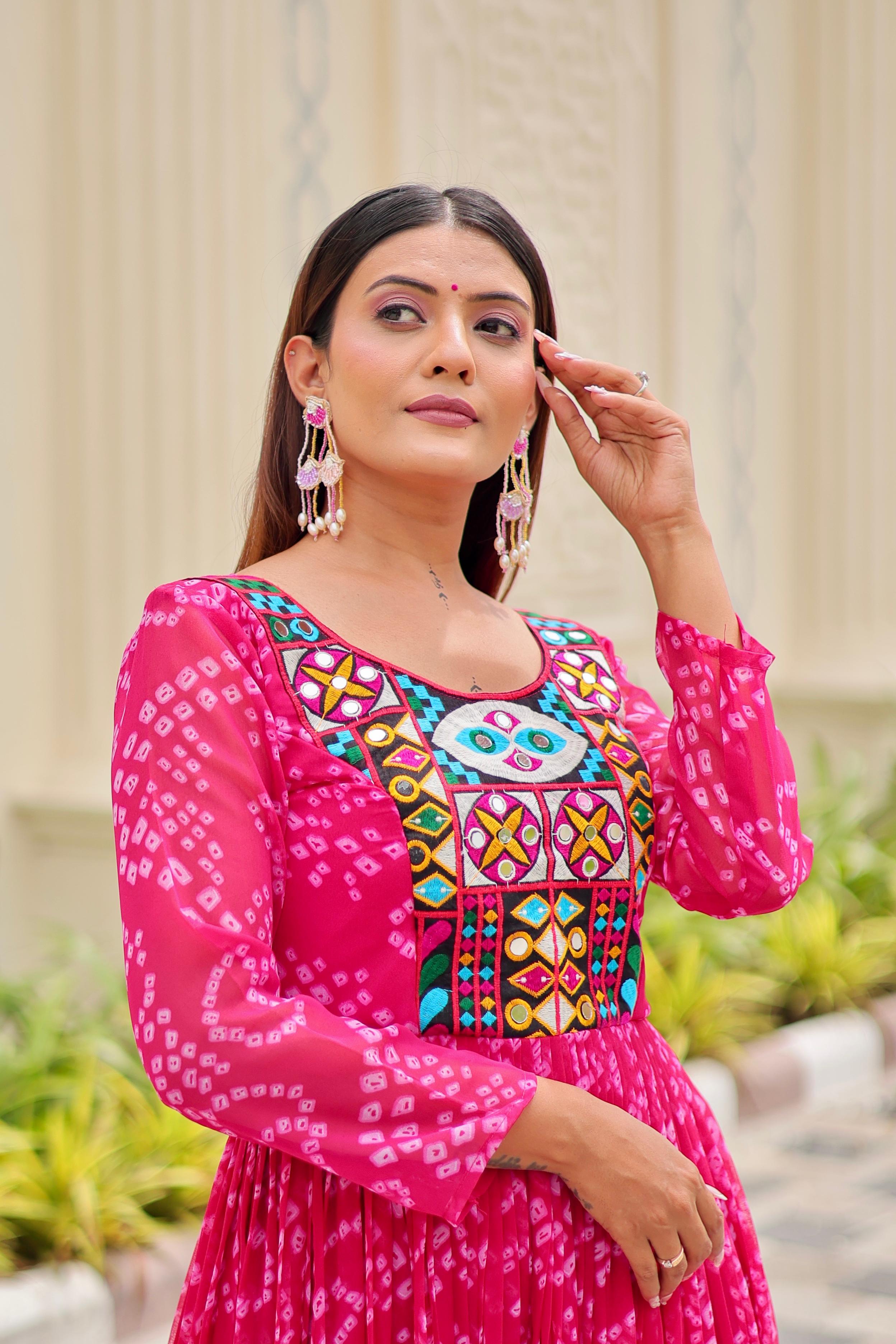 Close-up of embroidery thread work and mirror detail