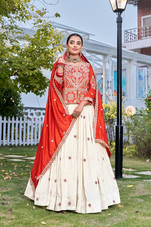 This traditional lehenga choli set is crafted for festive wear, combining intricate thread work with a graceful silhouette.