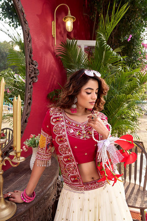 This designer lehenga choli set with koti is ideal for Navratri, sangeet, and wedding wear, featuring heavy embroidery on rich Vichitra fabric for a royal ethnic look.