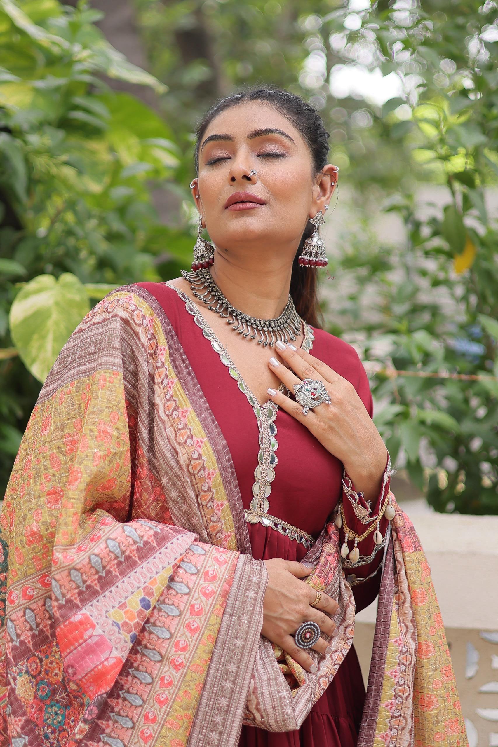 Roman fabric maroon color gown with mirror lace work and frill stitching