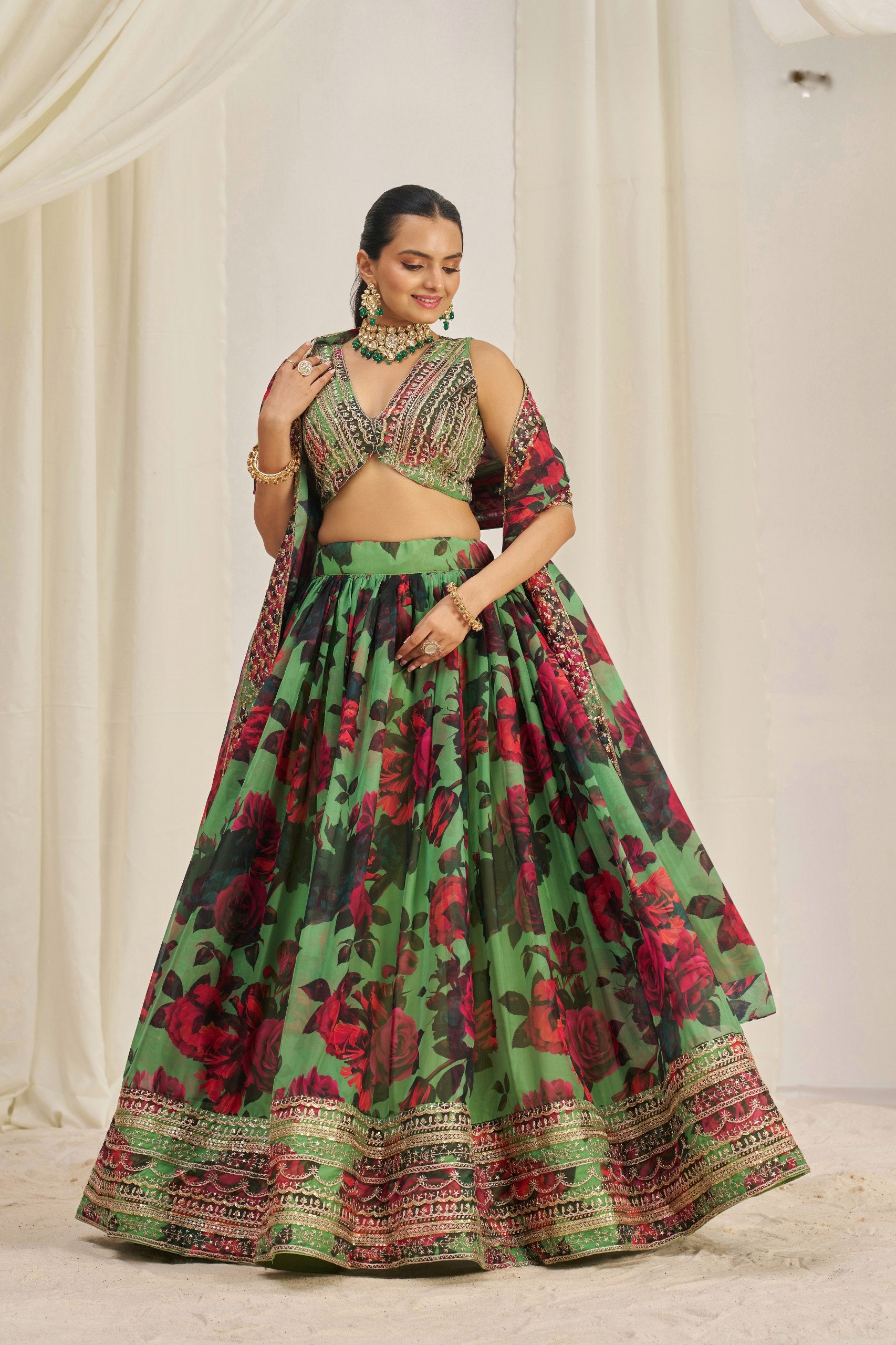 Lehenga flare showing vibrant floral design and embroidered border