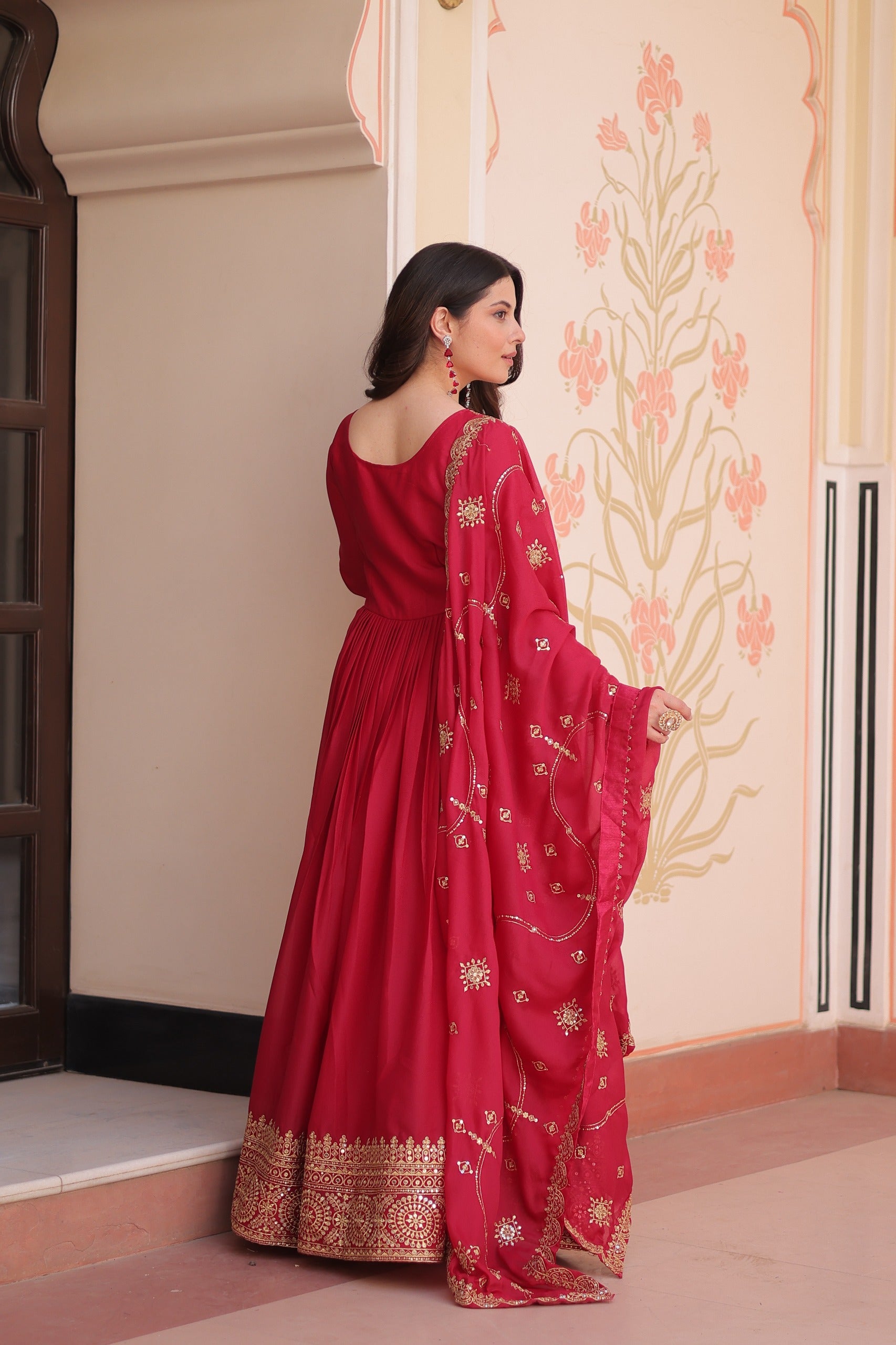 Star Georgette gown with full-sleeve and embroidered work for parties