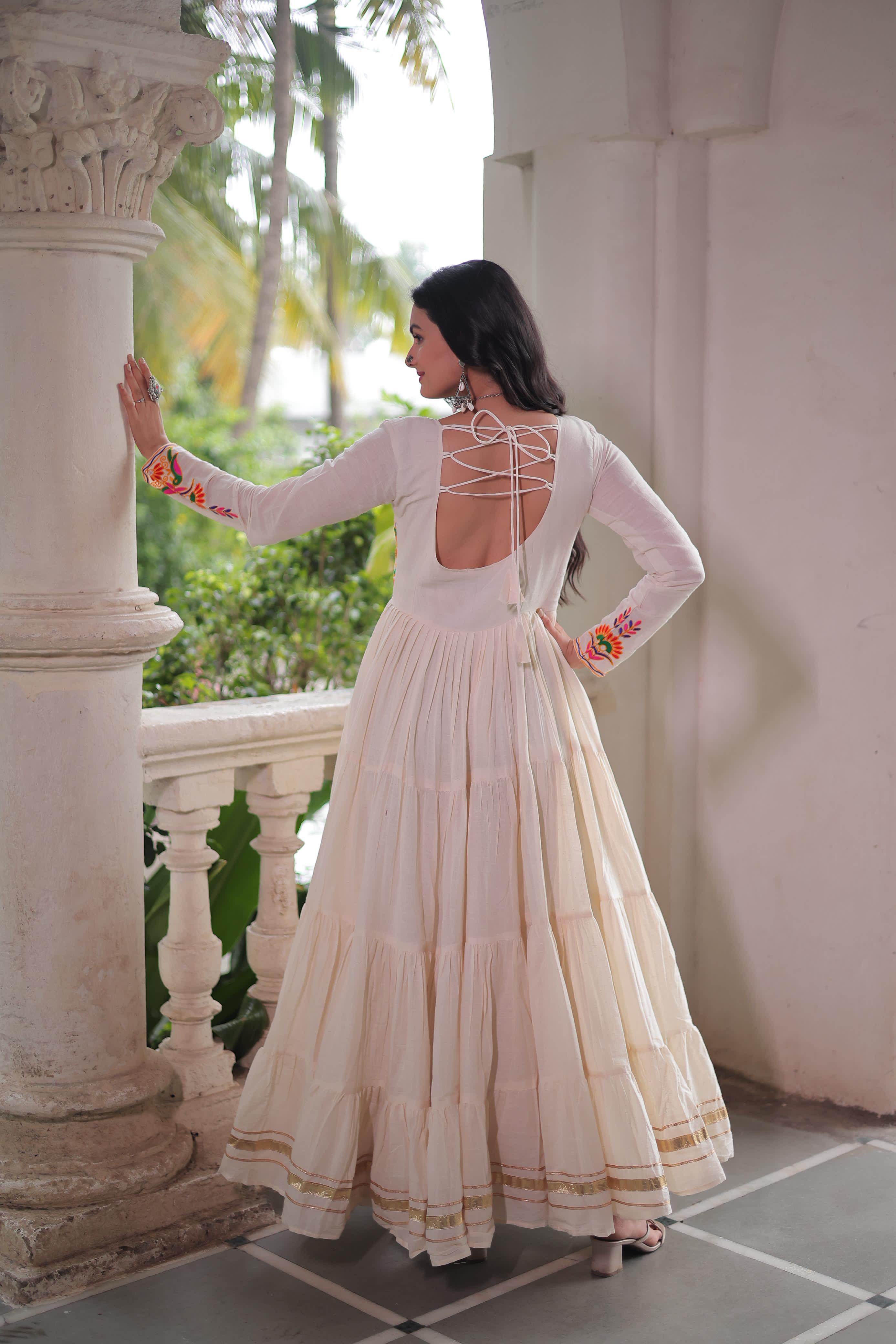 BACK profile of heavy flair ethnic gown