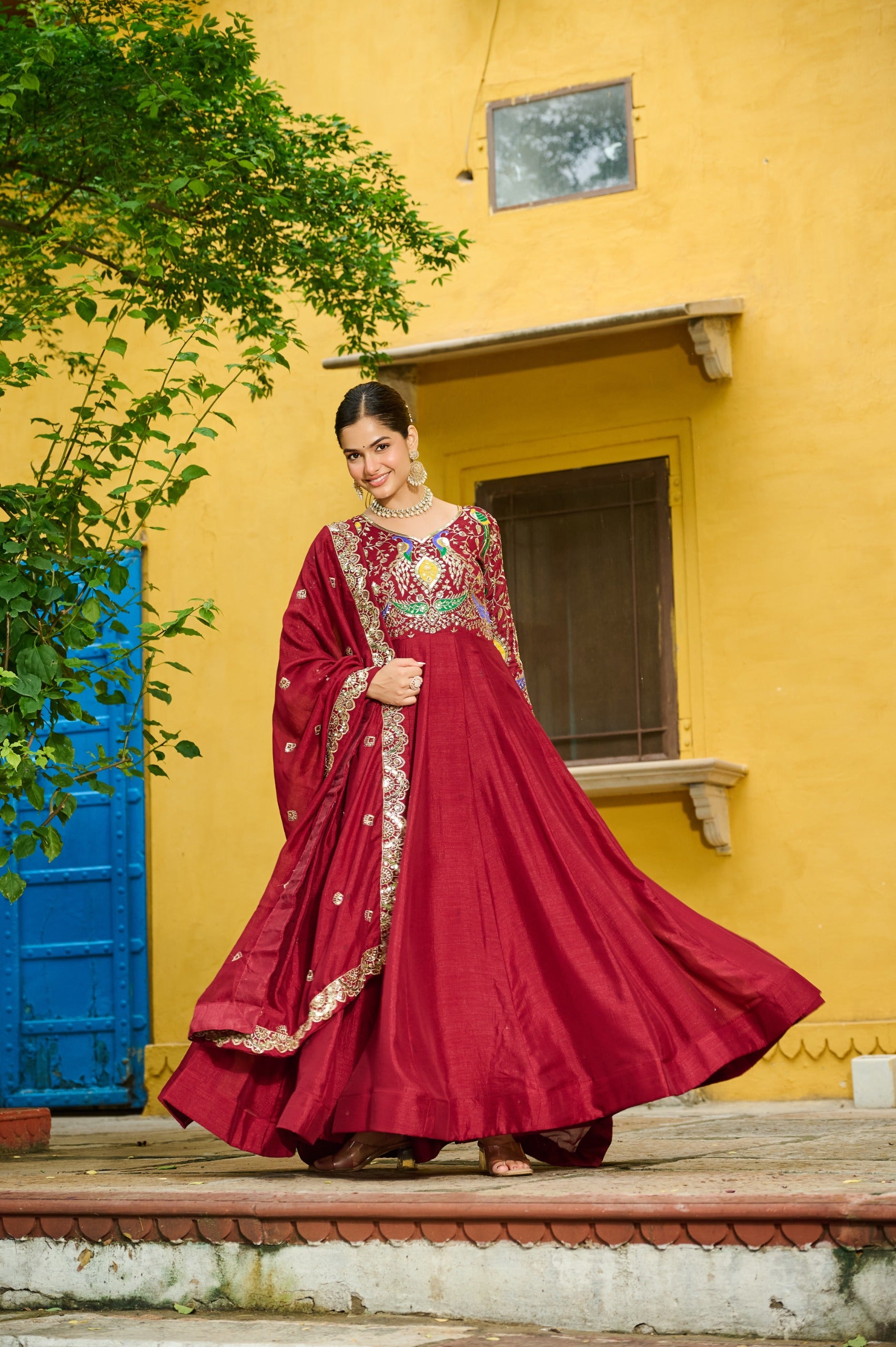 Vichitra fabric Maroon gown with elegant design
