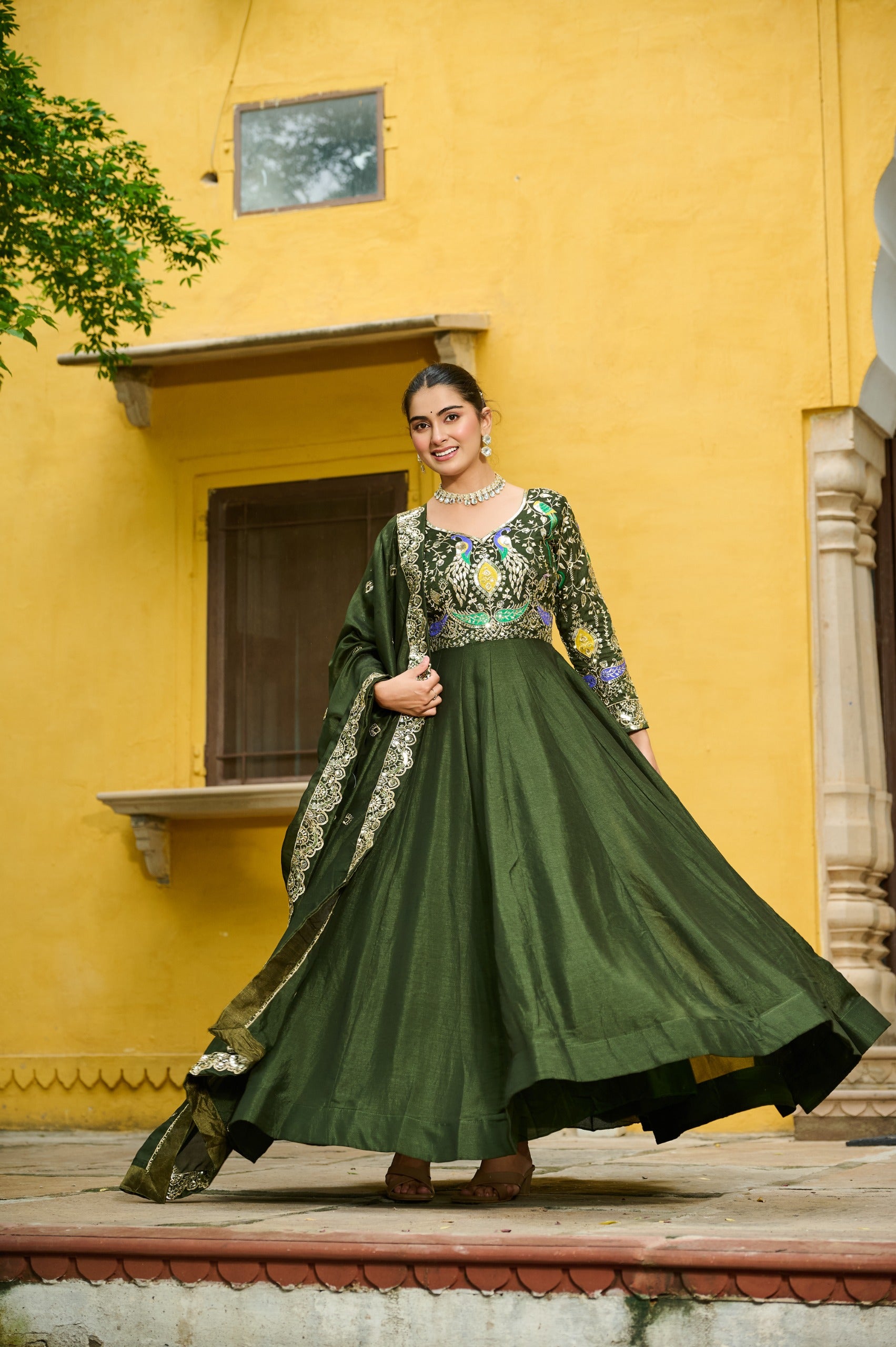 Vichitra fabric Mehendi gown with elegant design