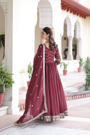 maroon Luxury Vichitra Silk gown with sequins and embroidery for special occasions