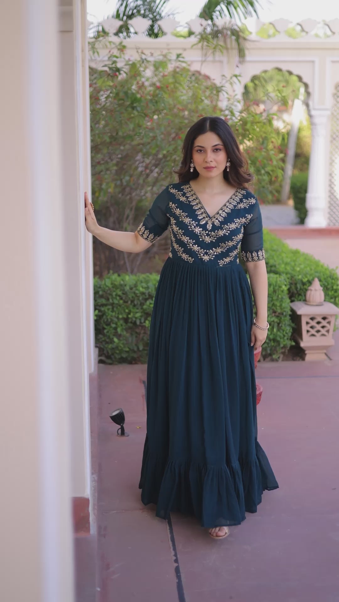 Rama green embroidered gown with frill flair and cotton inner – Vastralyn