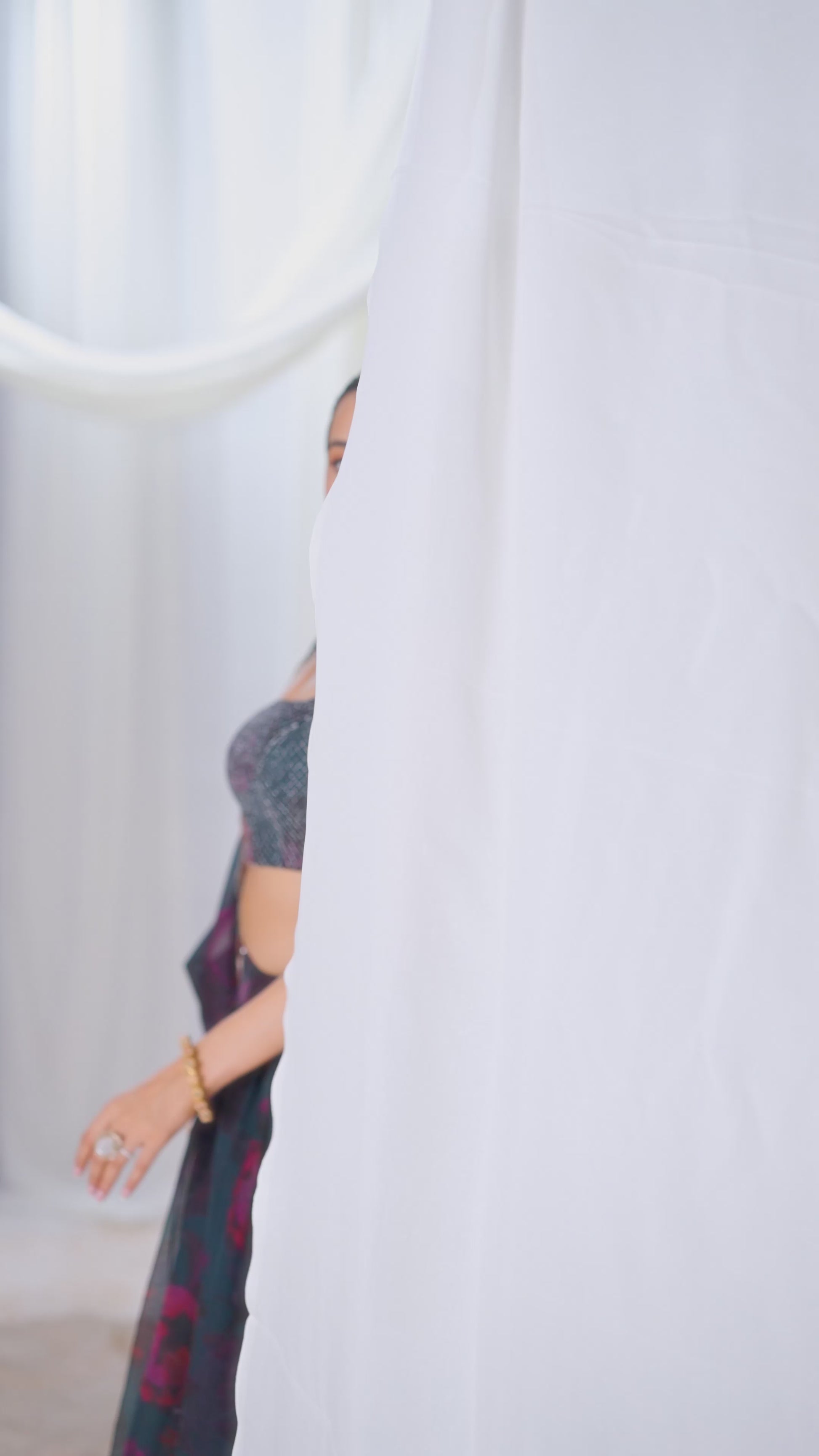 Full view of green floral organza lehenga with zari and sequin work