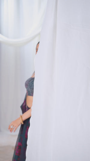 Full view of green floral organza lehenga with zari and sequin work