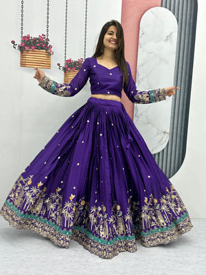 Woman wearing a purple embroidered traditional outfit with a white background