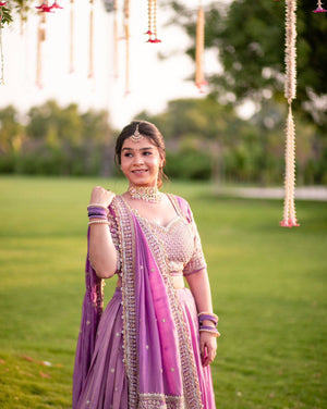 Purple ethnic wear for wedding celebration
