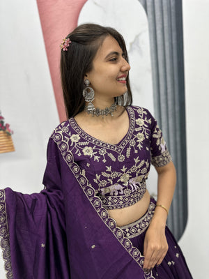 Close up of heavy thread embroidery on purple choli blouse