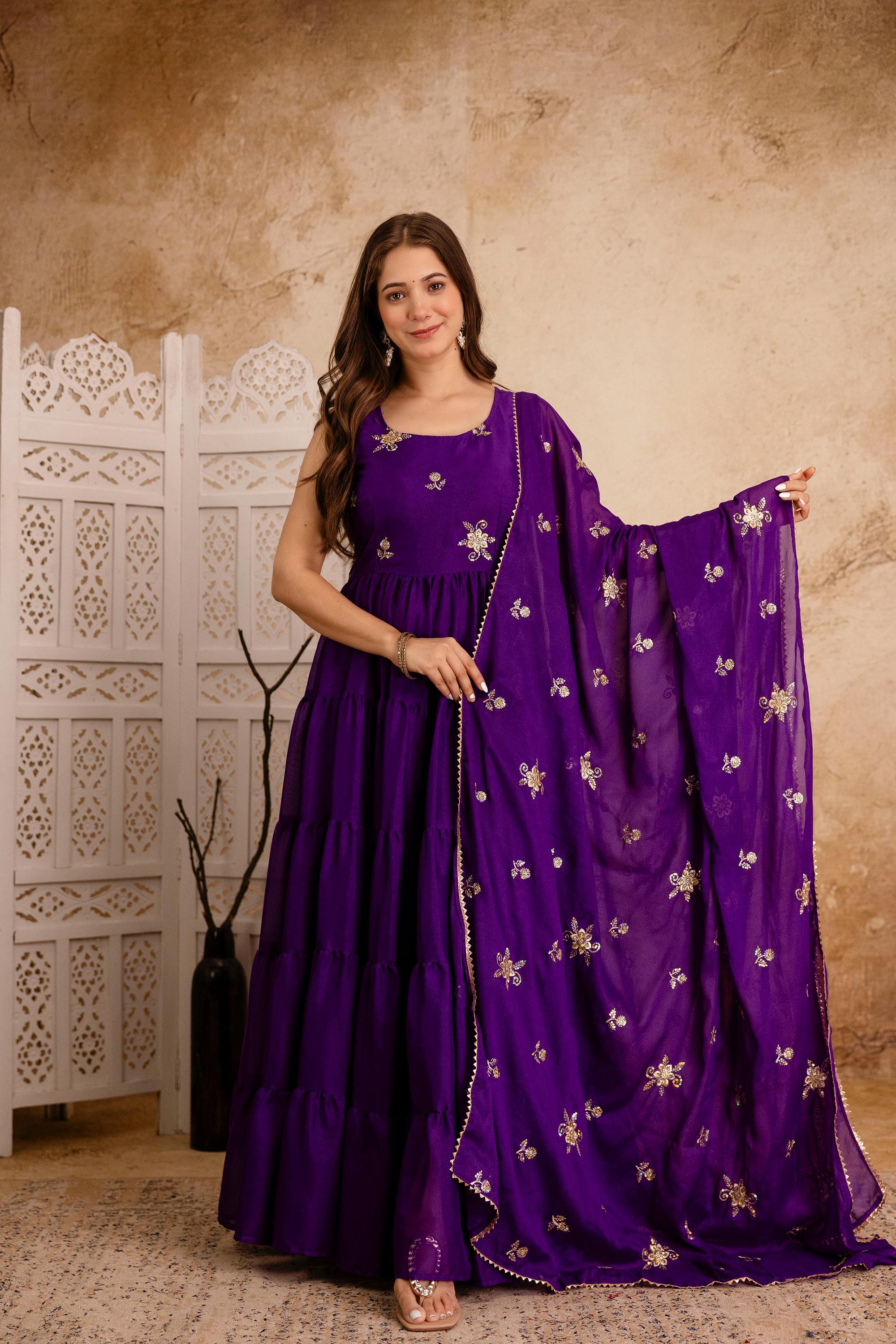 Purple heavy georgette Anarkali gown with micro cotton inner