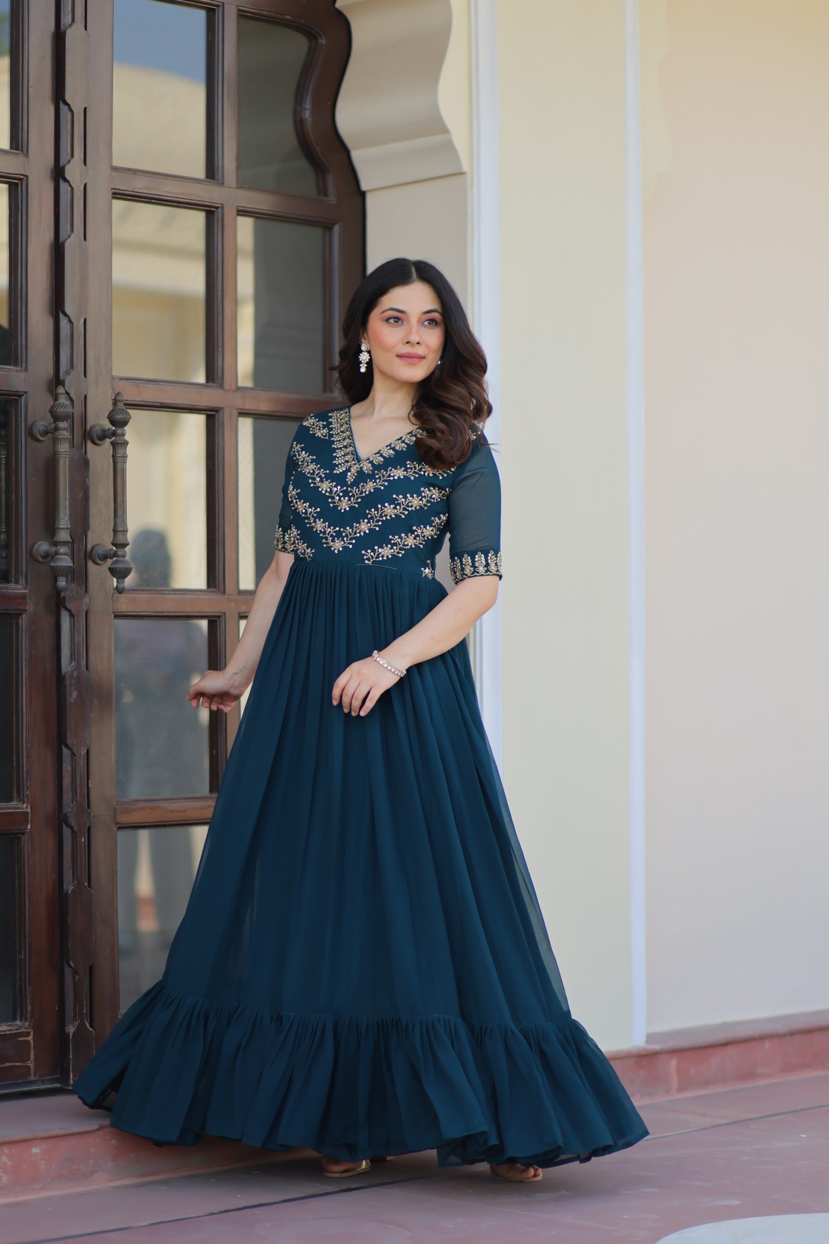 Premium faux blooming gown in Rama green with heavy embroidery