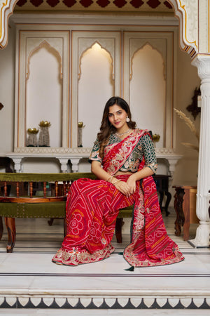 Festive ethnic look in pure Bandhej saree with handcrafted embroidery work