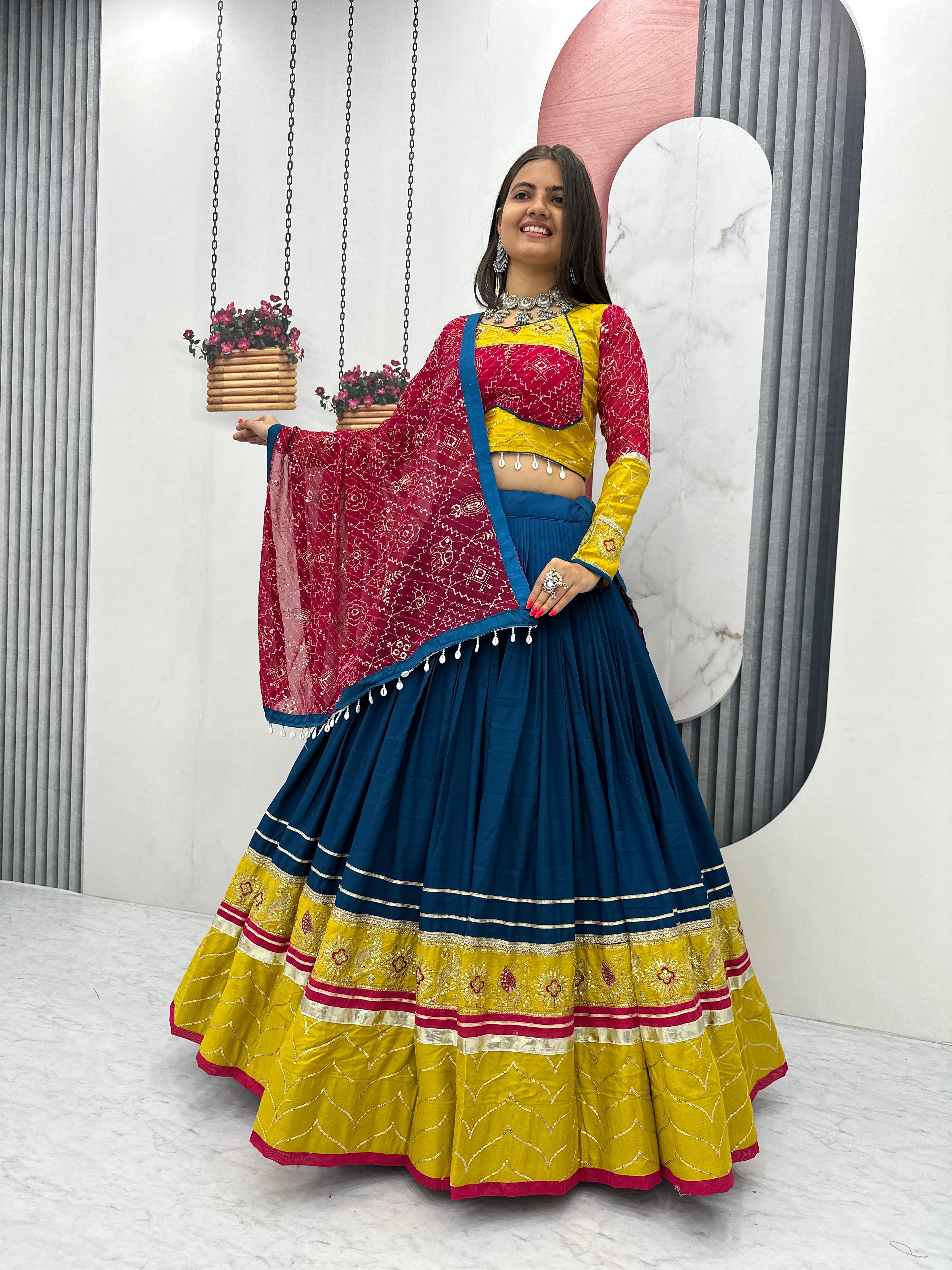 Mirror and thread embroidery on choli sleeves