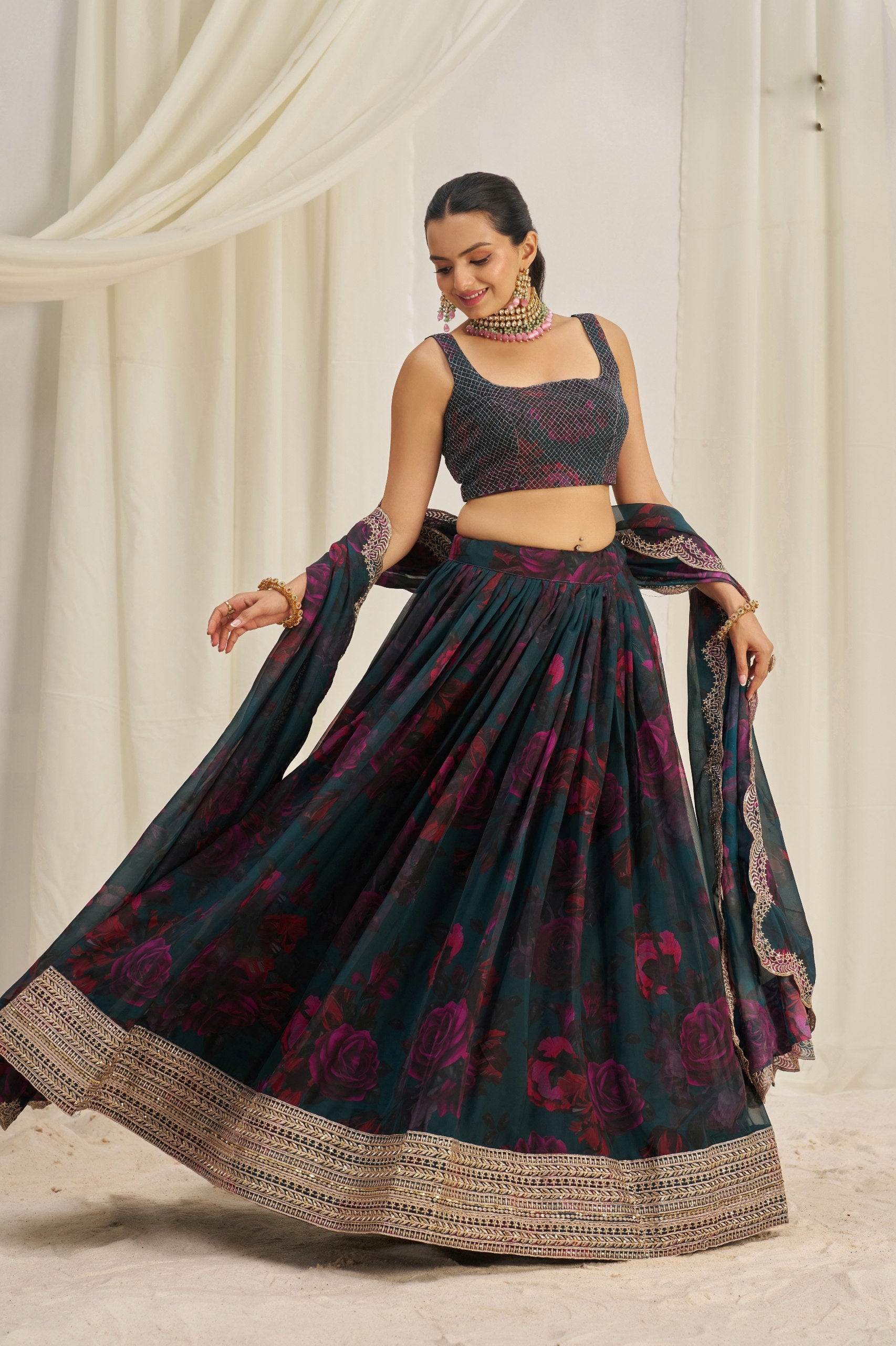 Royal festive look with green lehenga and matching blouse