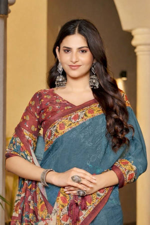 Teal blue saree with folk motifs