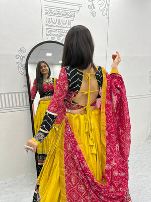 Model showing back design of lehenga choli