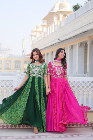 Two women in traditional dresses standing on a balcony with a building in the background