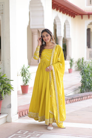yellow Vichitra Silk gown with dupatta with sequins and embroidered lace border