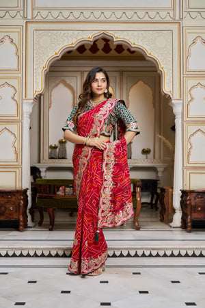Traditional Indian Bandhani saree with embroidered border and pallu design