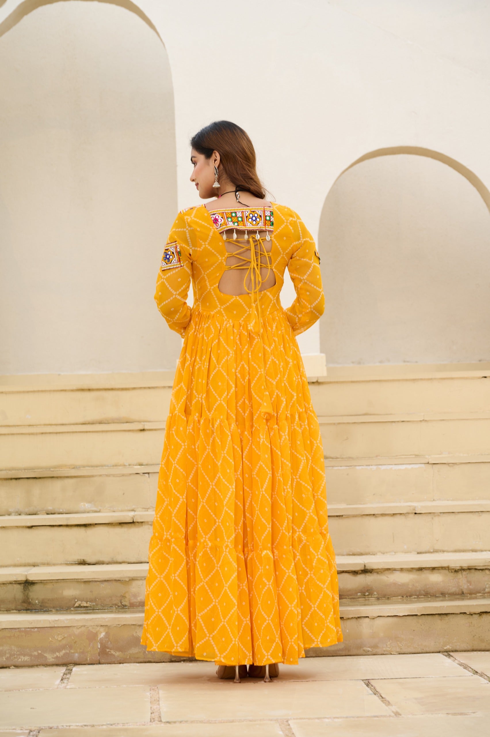 Detailed neck embroidery on YELLOW ethnic gown