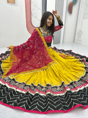 Yellow-black lehenga set with detailed ribbon lace borde