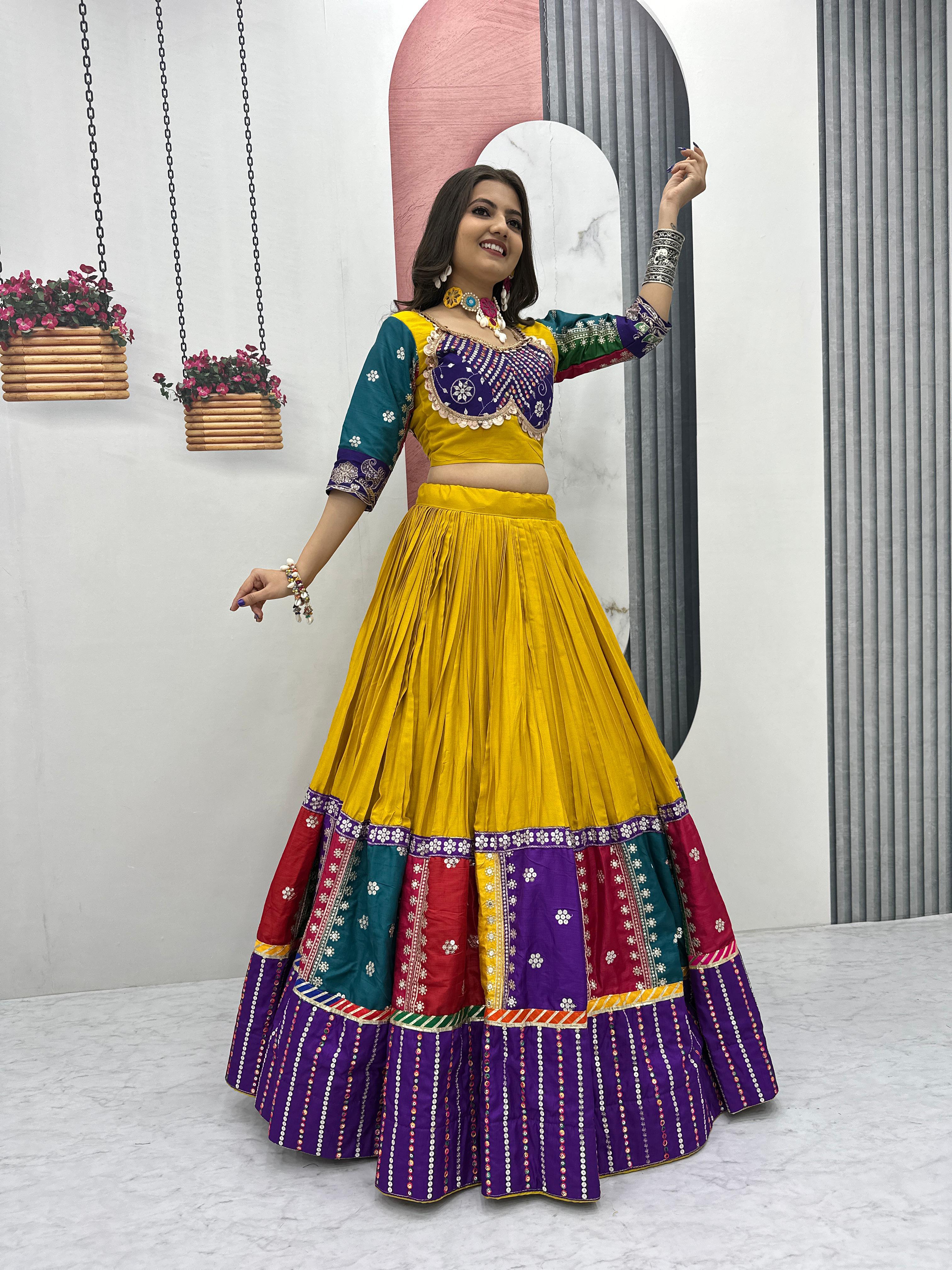 "Close-up of thread and sequence work on lehenga"