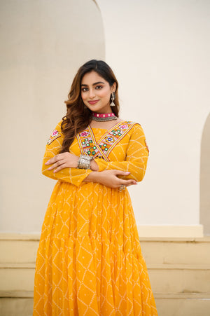 Full sleeve yellow bandhani gown with flared look