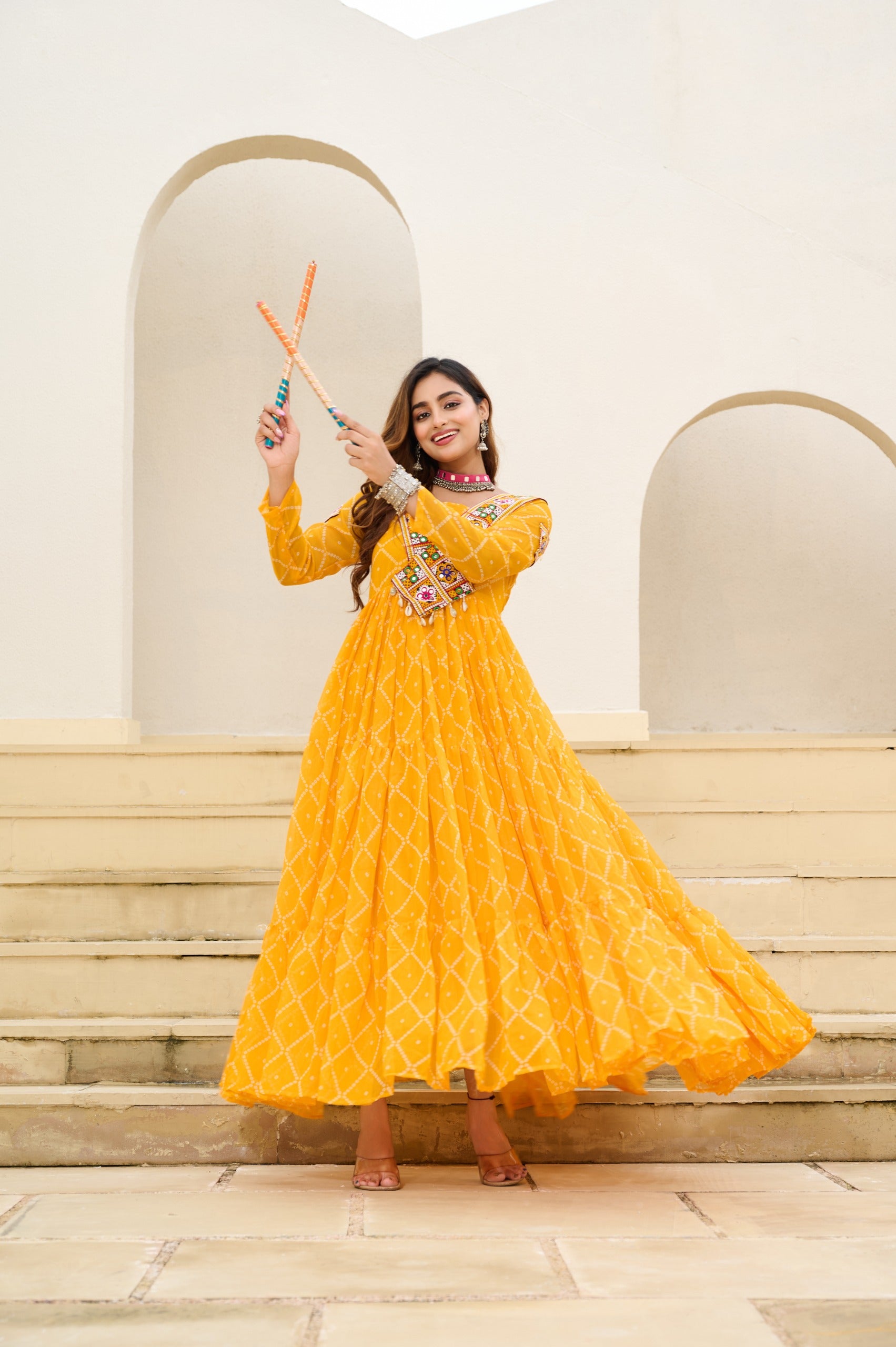 Yellow bandhani printed gown with kutchi patchwork