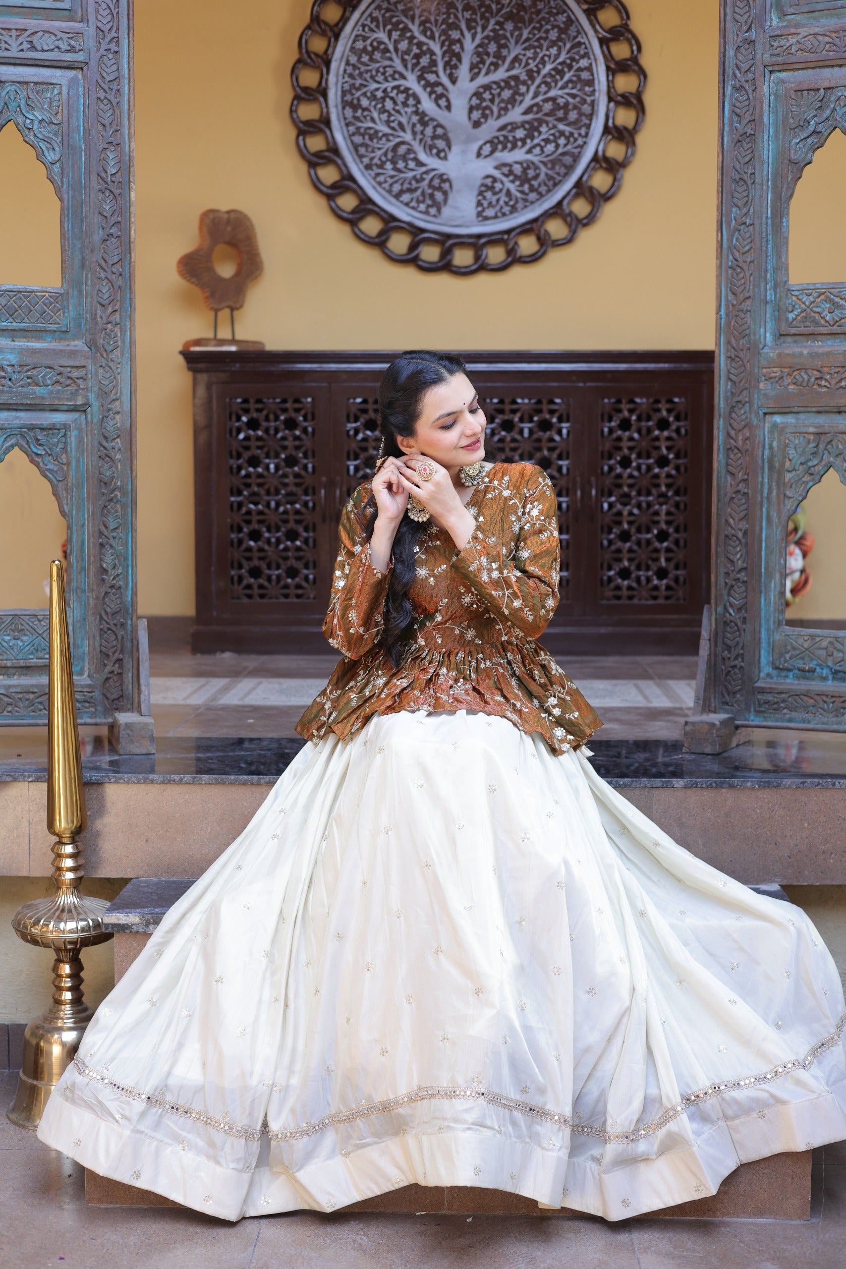 his crop top lehenga set with peplum blouse is perfect for festive and wedding wear, designed with rich embroidery and elegant flare.