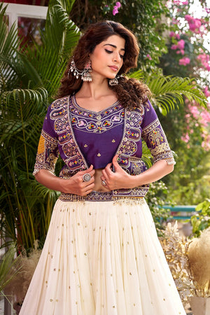 This purple embroidered lehenga choli with koti is perfect for weddings, festive occasions, and traditional functions, designed in premium Vichitra fabric with elegant thread work.