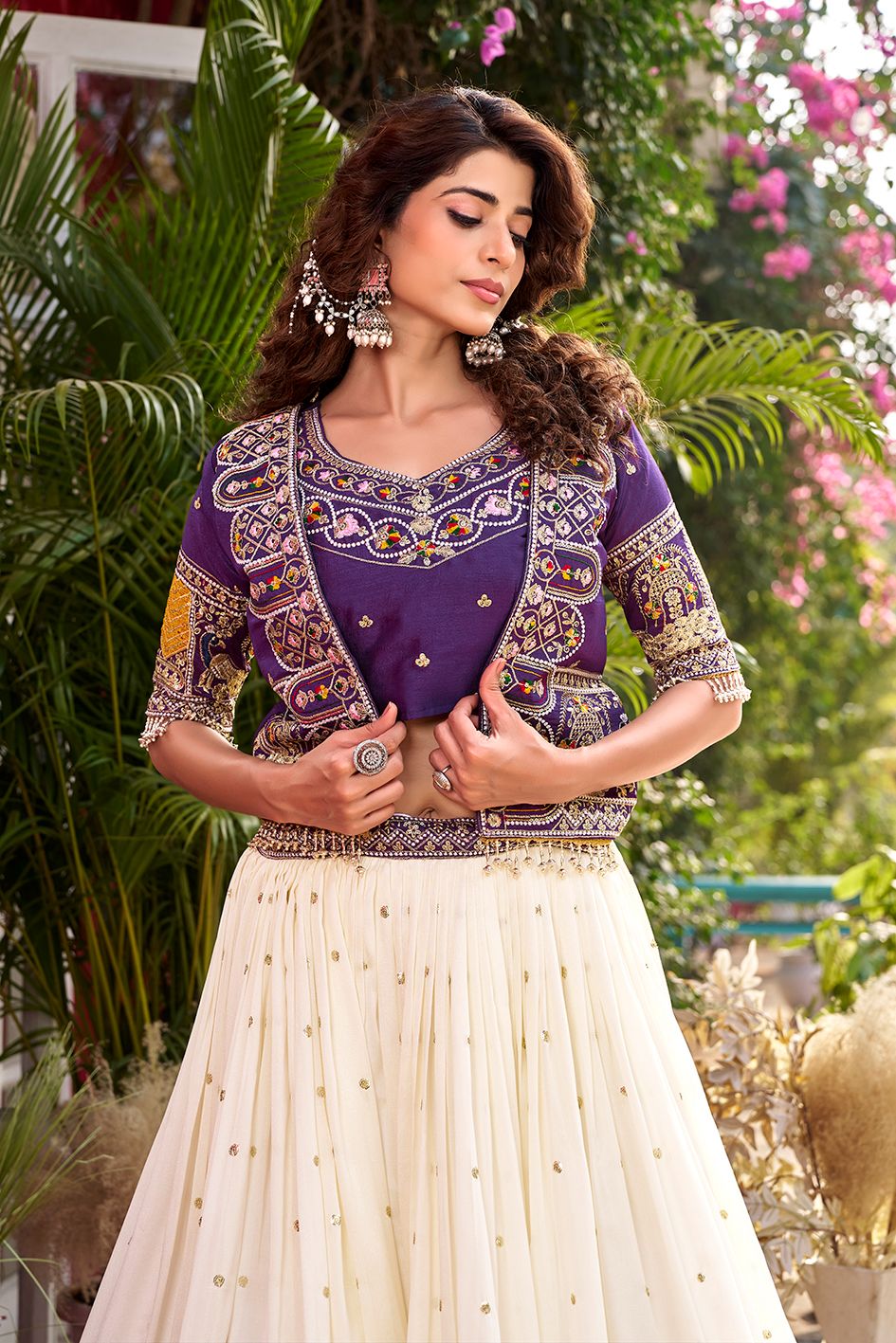 This purple embroidered lehenga choli with koti is perfect for weddings, festive occasions, and traditional functions, designed in premium Vichitra fabric with elegant thread work.