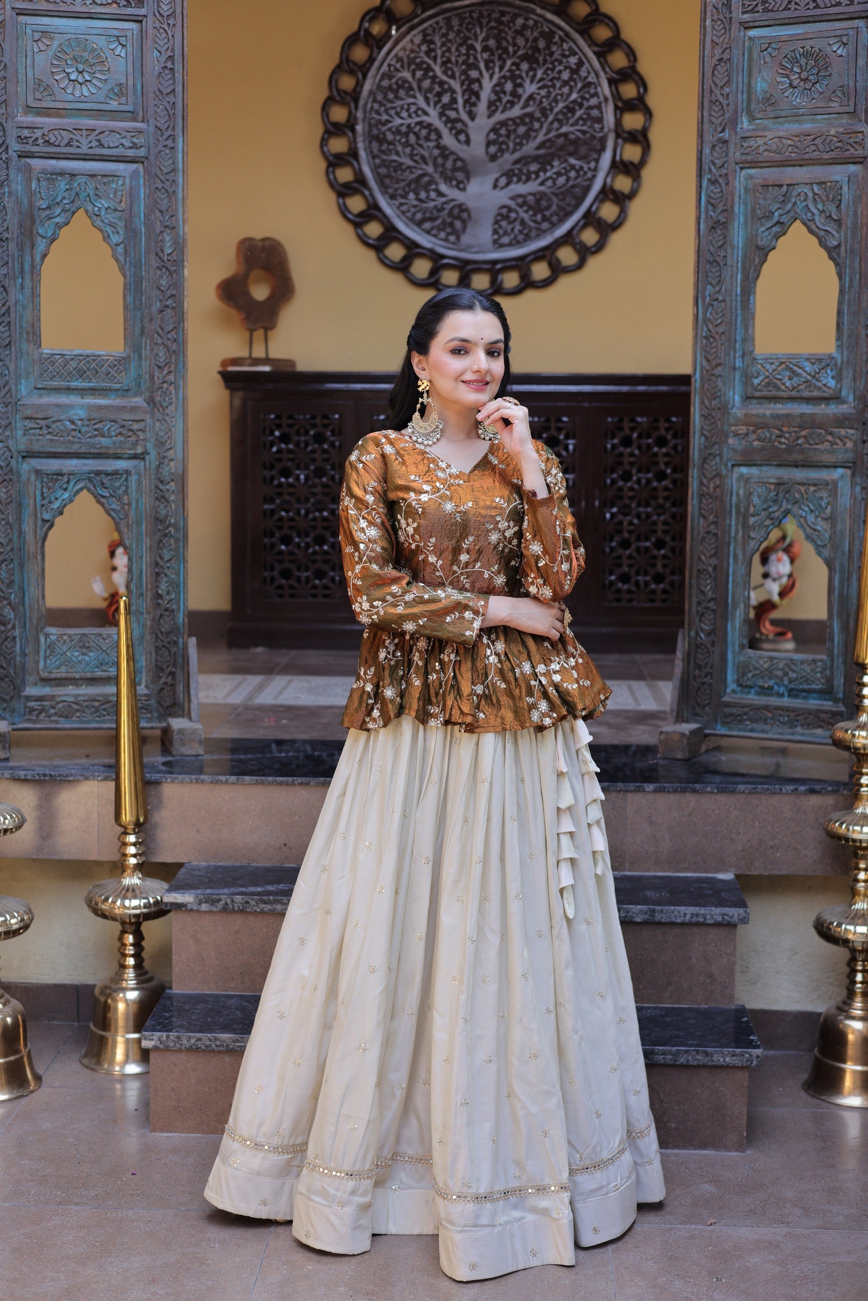 This embroidered lehenga set for women offers a modern ethnic look with sequins work and mirror lace detailing.