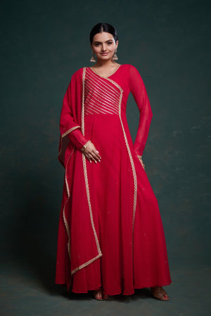 Woman wearing red georgette gown with dupatta
