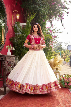 This festive lehenga choli with embroidered koti is crafted for special occasions, made from pure Vichitra fabric with detailed thread work and graceful flare.
