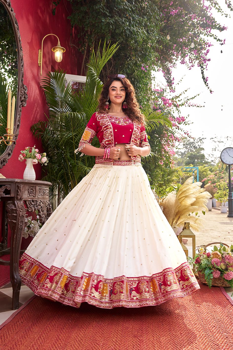 This festive lehenga choli with embroidered koti is crafted for special occasions, made from pure Vichitra fabric with detailed thread work and graceful flare.