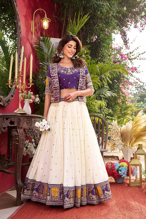 This traditional lehenga choli with koti is ideal for wedding events and cultural occasions, crafted with detailed embroidery and comfortable cotton inner lining.
