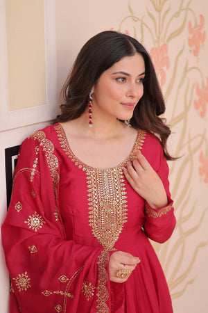 Full sleeve rani pink color gown with round neck and intricate embroidery